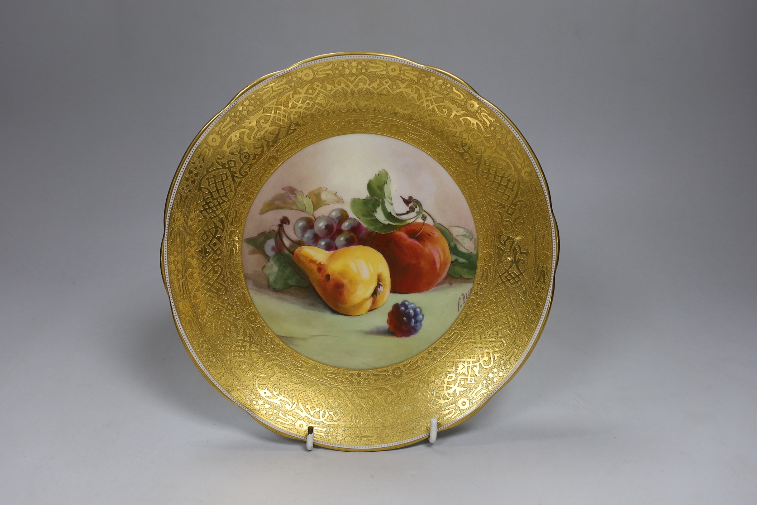 Two Minton fruit painted plates, one signed K Dean, 22.5cm diameter